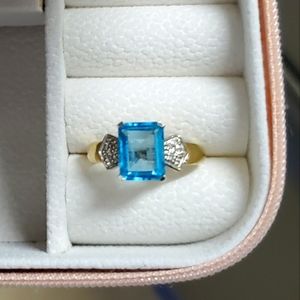 10k Blue Topaz ring with diamond acents